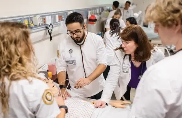 Nursing students with professors